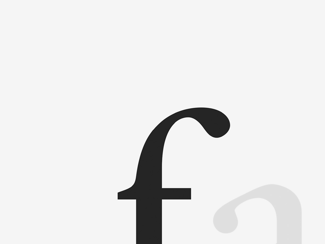 A white field, with a segment from the upper, piece of a black, lowercase ‘f,’ projecting from the centre of the bottom perimeter, as if the perspective has zoomed out from the prior image.